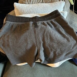 Men’s dark grey and black lulu lemon at ease shorts 7 inch inseam size MEDIUM